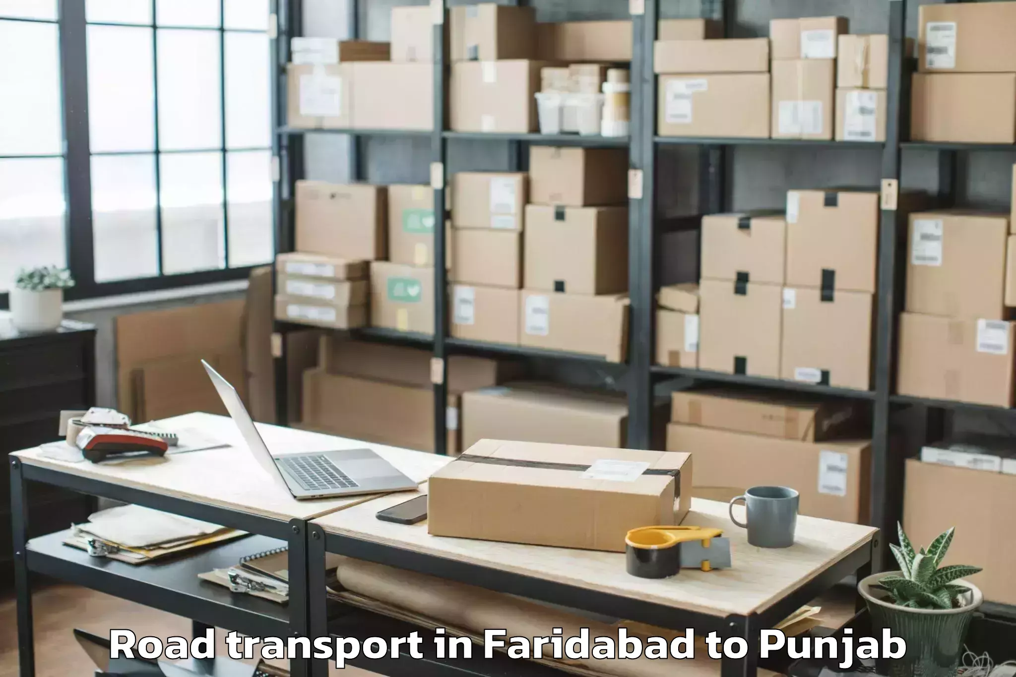 Top Faridabad to Fatehgarh Churian Road Transport Available